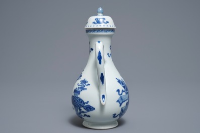 A Chinese blue and white ewer and cover with 'antiquities' design, Kangxi