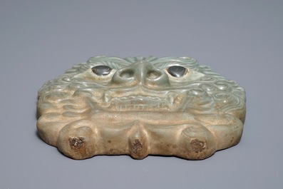 A Korean celadon-glazed mask, Goryeo or later