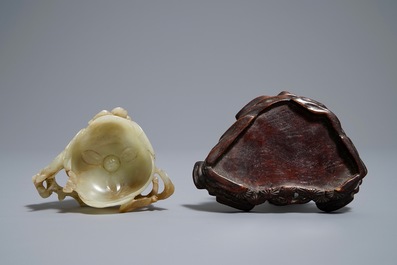 A Chinese lotus-shaped jade libation cup on stand, 18/19th C.