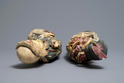 A pair of tall Chinese polychrome ivory figures on wooden bases, 19th C.