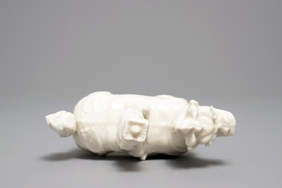 A Chinese Dehua blanc de Chine model of a man on a qilin, Kangxi