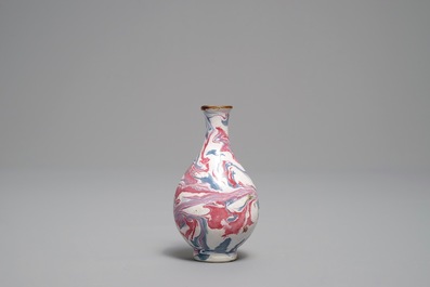 An unusual small Chinese faux-marbre-glazed vase, 18th C.