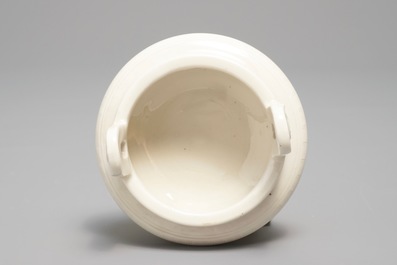 A Chinese Dehua blanc de Chine tripod censer, impressed seal mark, Kangxi