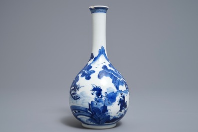 A Chinese blue and white bottle vase with figures in a landscape, Kangxi