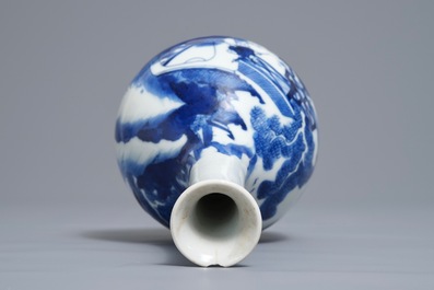 A Chinese blue and white bottle vase with figures in a landscape, Kangxi