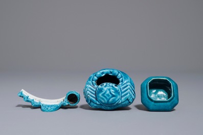 A Chinese turquoise-glazed brush rest and two small brushwashers, Kangxi