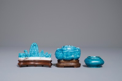 A Chinese turquoise-glazed brush rest and two small brushwashers, Kangxi