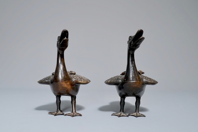 A pair of Chinese bronze duck-shaped incense burners and covers, 18/19th C.