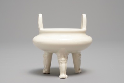 A Chinese Dehua blanc de Chine tripod censer, impressed seal mark, Kangxi