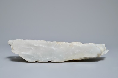 A Chinese white jade group with boys on a raft on carved wooden base, Qing