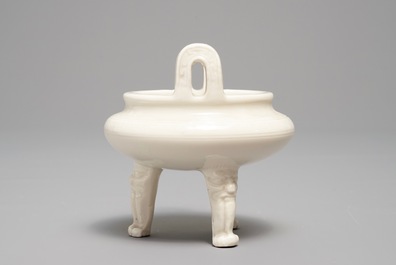 A Chinese Dehua blanc de Chine tripod censer, impressed seal mark, Kangxi