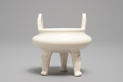 A Chinese Dehua blanc de Chine tripod censer, impressed seal mark, Kangxi