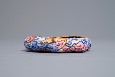 A Chinese famille rose brush washer with moulded design of bats, Qianlong mark, 20th C.