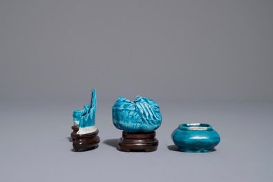 A Chinese turquoise-glazed brush rest and two small brushwashers, Kangxi