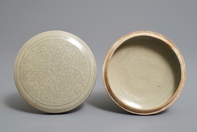 A Chinese grey-glazed round box and cover with underglaze design, Northern Song or later
