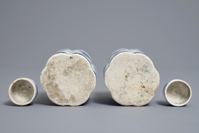 A pair of Chinese blue and white tea caddies and covers, Kangxi