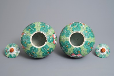 A pair of Chinese famille rose 'cabbage' jars and covers, 19th C.