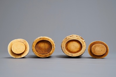 A pair of Chinese ivory vases and covers with figures in landscapes, 1st quarter 20th C.