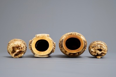 A pair of Chinese ivory vases and covers with figures in landscapes, 1st quarter 20th C.