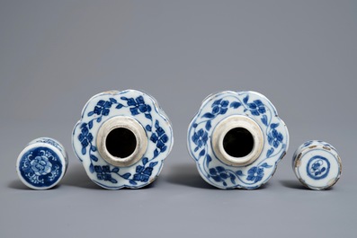A pair of Chinese blue and white tea caddies and covers, Kangxi