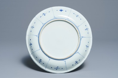 A Chinese blue and white kraak porcelain dish with a bird on a rock, Wanli