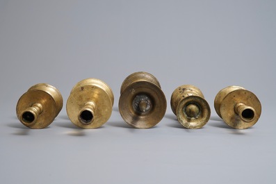 Five Flemish bronze and brass pricket and 'Heemskerk' candlesticks, 16/17th C.