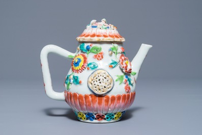 A Chinese famille rose teapot with applied floral design, Yongzheng