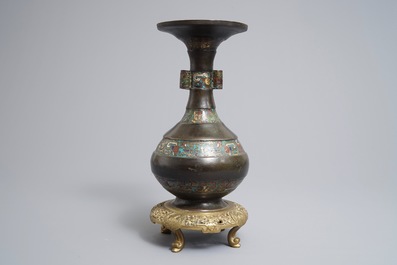 A Chinese bronze and champlev&eacute; enamel vase, 17/18th C.
