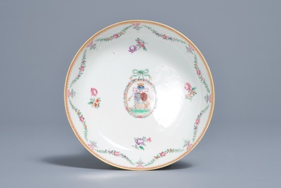 A Chinese grisaille and famille rose armorial teapot and cup and saucer, Qianlong