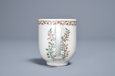 A Dutch-decorated Chinese cup with the royal Dutch arms of Oranje-Nassau, dated 1747, Qianlong