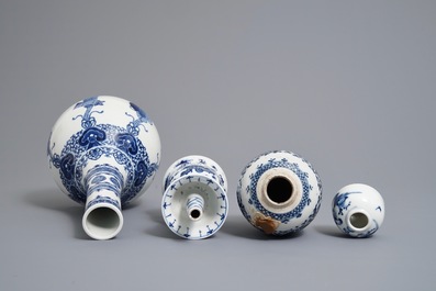 Two Chinese blue and white vases, a candlestick and a brush washer, 19th C.