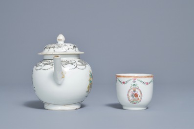 A Chinese grisaille and famille rose armorial teapot and cup and saucer, Qianlong