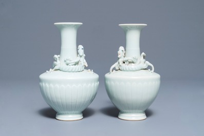 A pair of Chinese ru-style glazed vases with applied qilong, Yongle mark, 19th C.
