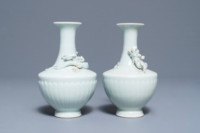A pair of Chinese ru-style glazed vases with applied qilong, Yongle mark, 19th C.