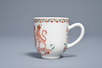 A Dutch-decorated Chinese cup with the royal Dutch arms of Oranje-Nassau, dated 1747, Qianlong