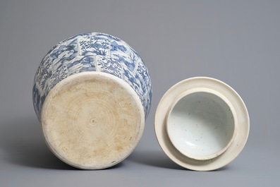 A large Chinese blue and white three-piece garniture with landscape and floral panels, Kangxi