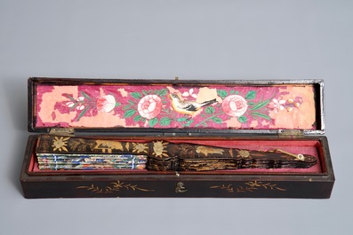 Two Chinese lacquer and painted paper fans with original boxes, Canton, 19th C.