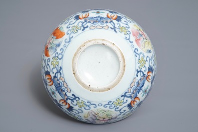A Chinese famille verte vase and a famille rose bowl, 19th C.