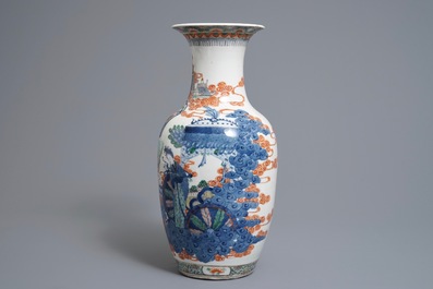 A Chinese famille verte vase and a famille rose bowl, 19th C.