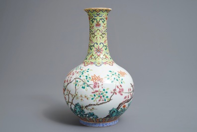 A Chinese famille rose bottle vase with floral design, Jiaqing mark, 19/20th C.
