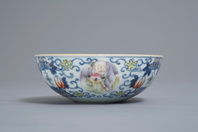 A Chinese famille verte vase and a famille rose bowl, 19th C.
