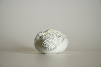 A Chinese Dehua blanc de Chine model of a standing Buddha, impressed mark on the back, Kangxi