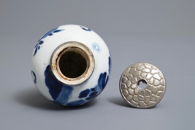 A Chinese 'milk and blood' dish, a blue and white klapmuts bowl and a tea caddy, Kangxi