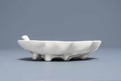 A Chinese Dehua blanc de Chine leaf-shaped brush washer, Kangxi