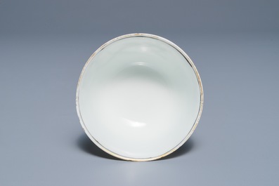 Une tasse et soucoupe armori&eacute; en porcelaine de Chine grisaille et dor&eacute;, Qianlong