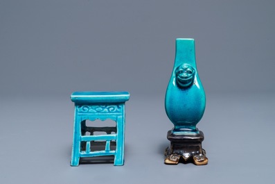 A Chinese turquoise and aubergine-glazed miniature vase on stand and a table, Kangxi