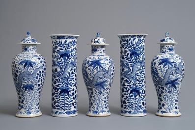 A Chinese blue and white five-piece garniture with dragons, Kangxi marks, 19th C.