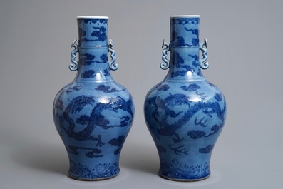 A pair of Chinese lavender blue vases with underglaze dragons, 18/19th C.