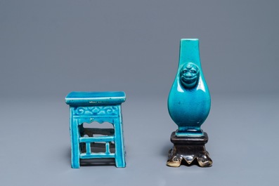 A Chinese turquoise and aubergine-glazed miniature vase on stand and a table, Kangxi
