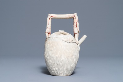 A Chinese biscuit 'conjoined peach' teapot and cover, Kangxi/Yongzheng